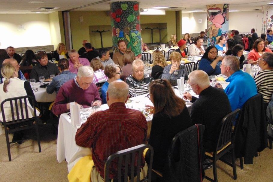 Volunteer Dinner guests dining at tables