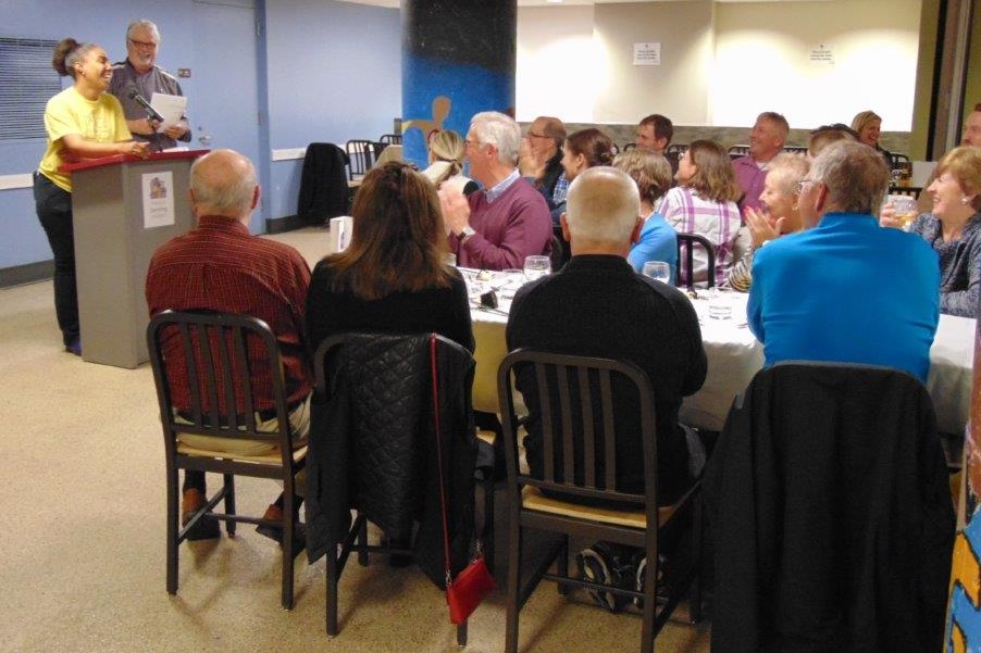 Volunteer Dinner guests listening to the presentation