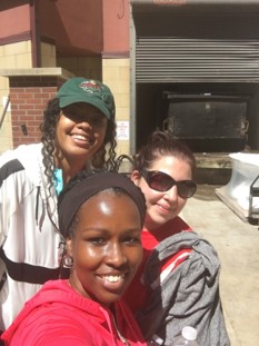 3 women from Cummins playground installation.