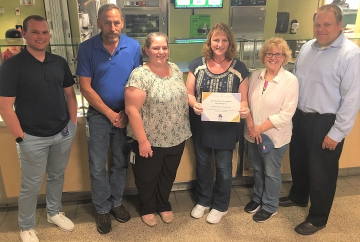 Volunteers from Ameriprise Financial pose with 29-Year Service Award