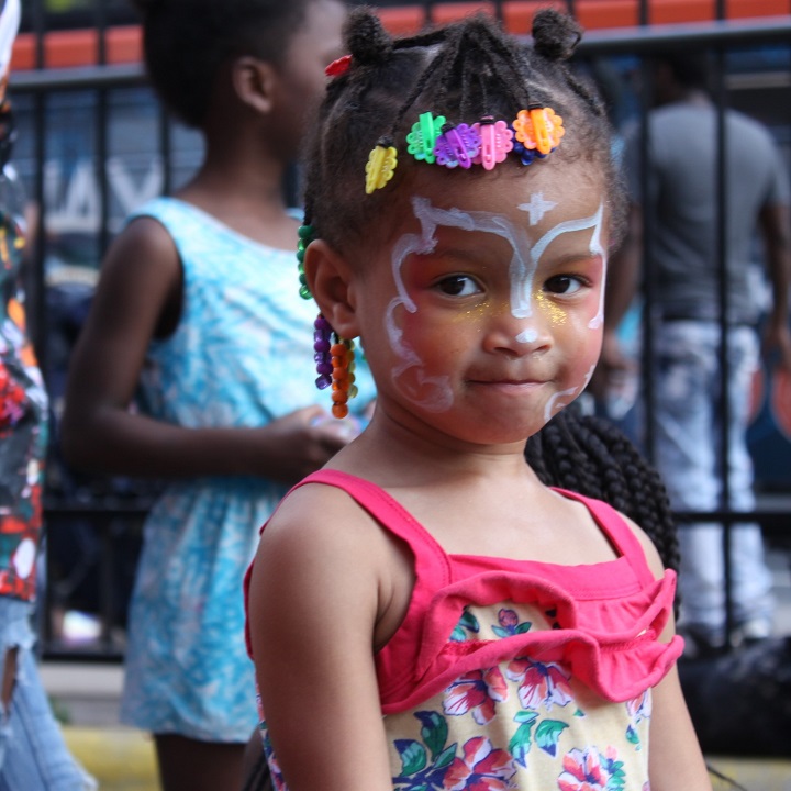 Girl decorated with face paint