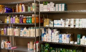 Photo of closet shelves with a variety of hygiene products.
