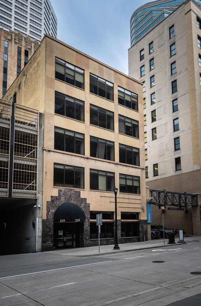 Image of a 5 story building in downtown Minneapolis that was once a hotel.